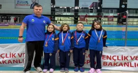 İnegöllü minik yüzücülerden 18 madalyalık gurur