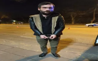 Ceza yememek için taksinin bagajında yolculuk yaparken polislere yakalandı

