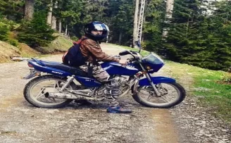 Motosiklet tutkunu gençten geriye bu fotoğrafı kaldı
