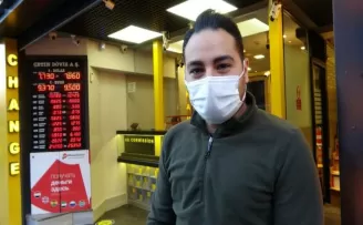 Sahte pasaportla para çekmek isteyen dolandırıcı kıskıvrak yakalandı