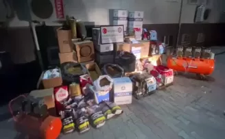 Üstü kozmetik dükkanı, altı kaçak sigara imalathanesi