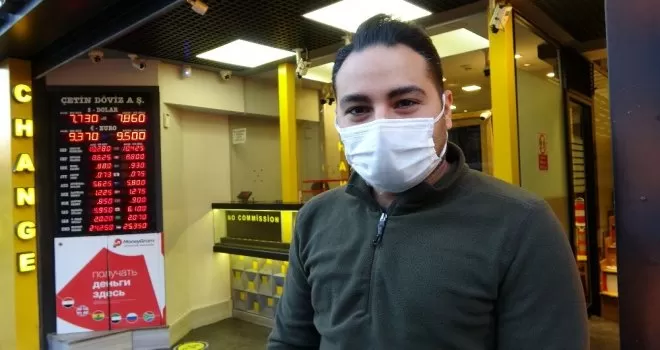 Sahte pasaportla para çekmek isteyen dolandırıcı kıskıvrak yakalandı